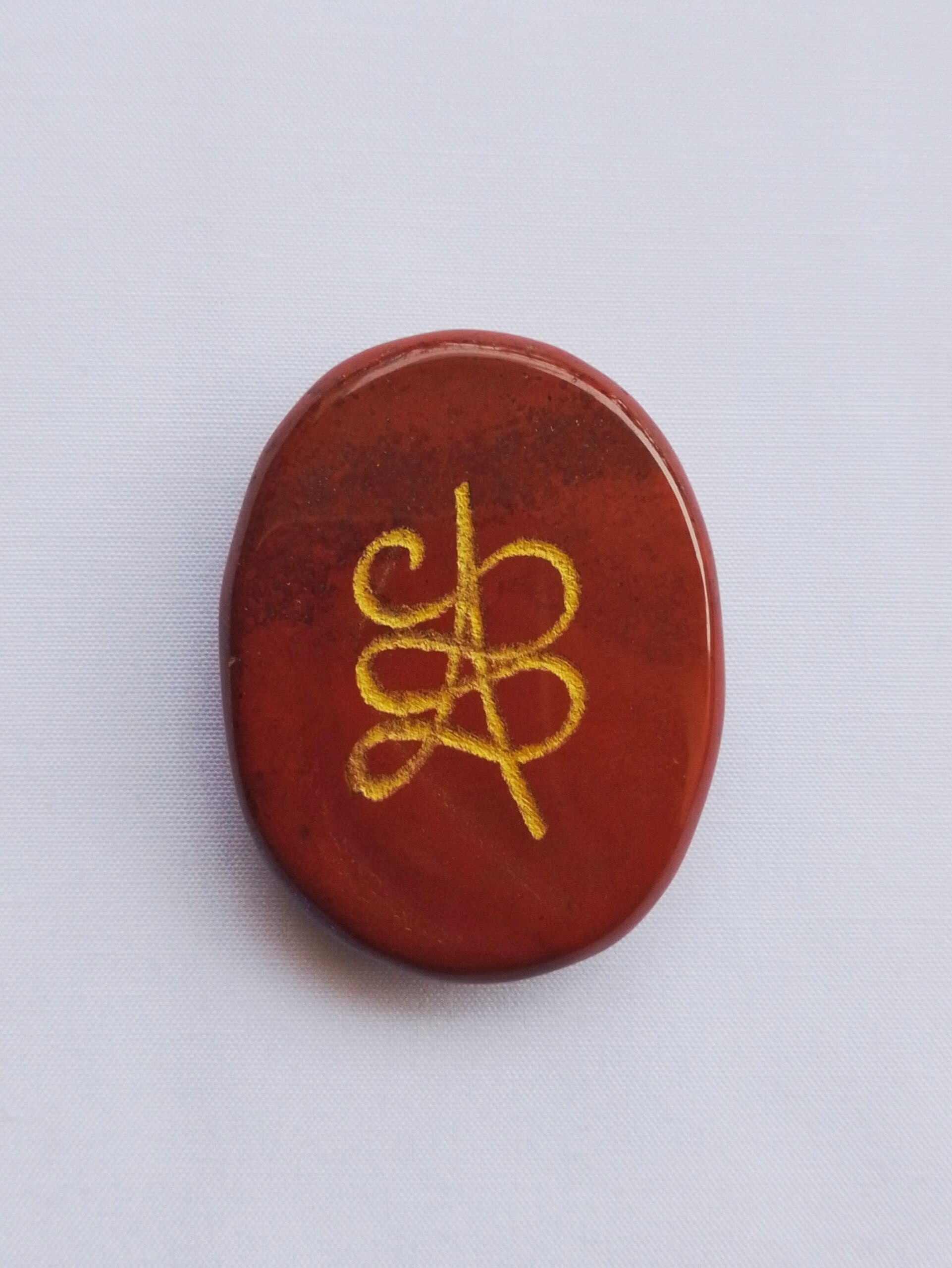 Red Jasper Zibu Symbol Coin for Strength & Energy - Image 2